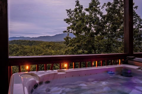 Relaxing 6-person hot tub with scenic backdrop