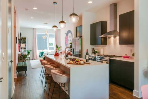 Discover this chic vacation rental that combines elegance and comfort. With a spacious layout, modern kitchen, and stylish decor, it's ideal for entertaining or family reunions. Enjoy gathering with friends at the island, sipping wine after exploring downtown Nashville—your upscale oasis awaits!