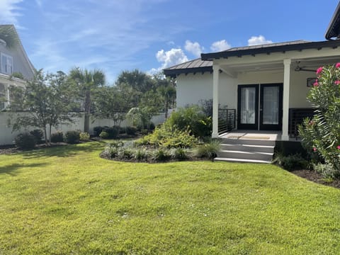 View of private entrance to Master Bedroom #1 and side garden