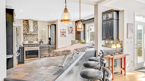 Natural wood bar with four handmade wooden bar stools (not pictured here)