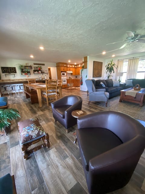 Club chairs with the best view in front of full length picture window