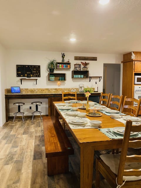 So many places to serve your meals, 9ft. table, 12ft buffet, kitchen on right