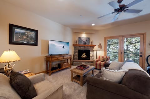 Main Living Space - TV, Gas Fireplace and Deck