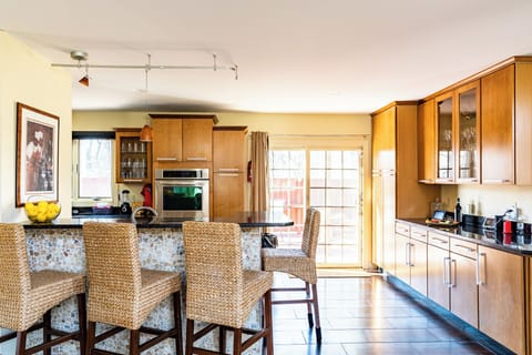 Kitchen seating, door to the patio