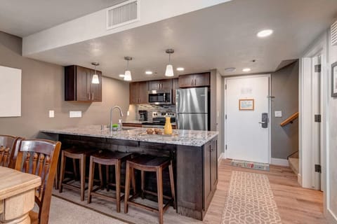 enjoy the open kitchen and dining area.