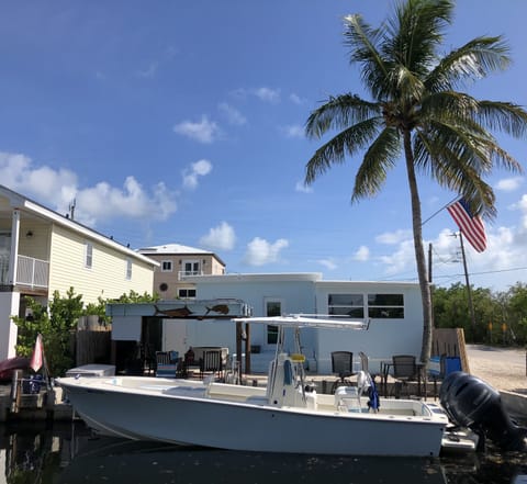 Back of home, showing canal and dock. 
