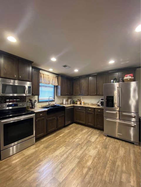 Kitchen stocked with pots, dishes, etc plus empty cabinets for your groceries.