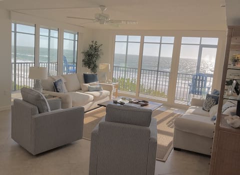 Living room with wrap around balcony.