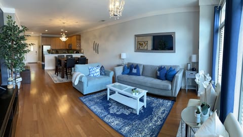 Comfortable queen size sofa bed with great lighting in the living room.