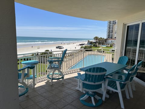 Your private ocean front balcony can seat up to nine guests. 