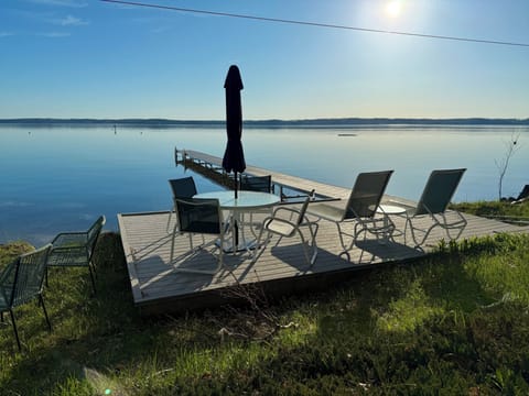 Notice person on standup paddle board on the lake - so peaceful
