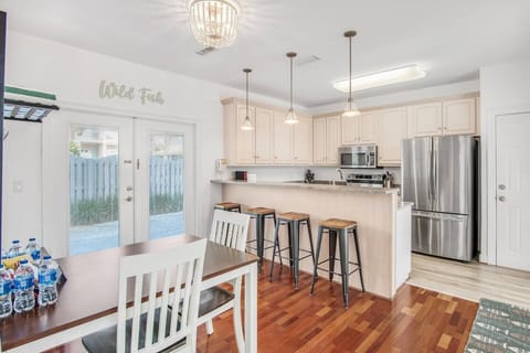 Beautifully remodeled kitchen complete with new stainless steel appliances, new countertops, and new paint with bar and breakfast seating.