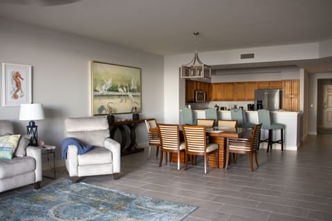 Panoramic of Living, Dining, and Kitchen Space
