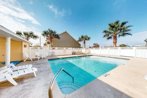 The shared pool is just a short walk from your front door...