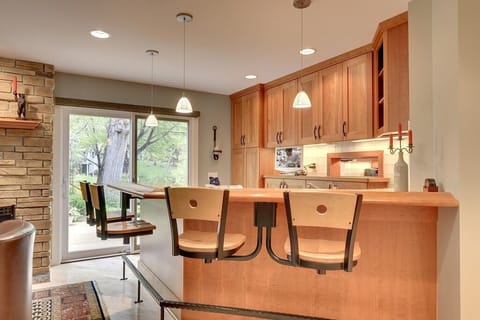 Bar with sliding door out to large deck