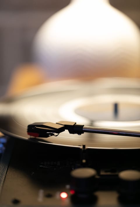 There's a record player and a fun assortment of records!