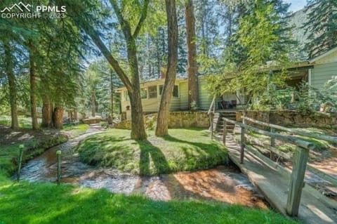 Private and peace filled creekside backyard