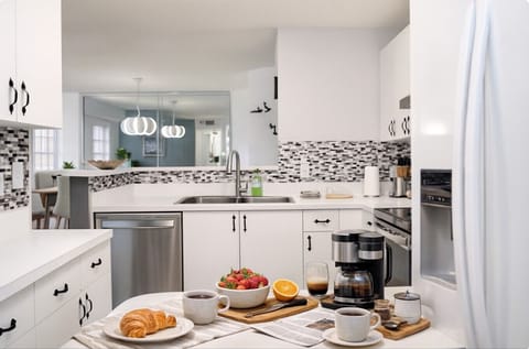 Fully equipped kitchen with modern appliances — perfect for weekly stays and home-cooked meals.