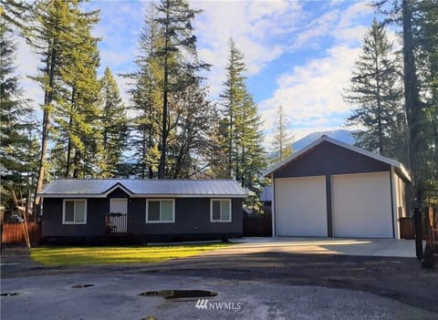 Home is nestled among the cedars at the end of a quiet cul-de-sac.
