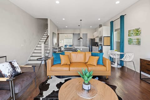 Modern, open-concept space ideal for hosting or relaxing in style!