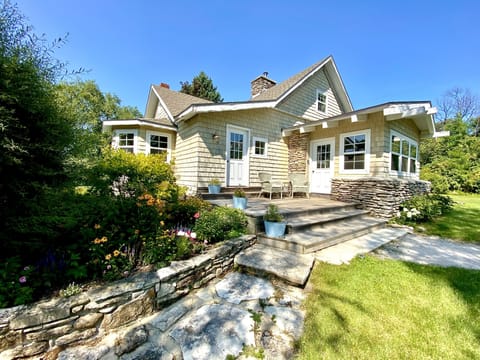 Charming home with lots of yard space & fire pit all surrounded by nature.