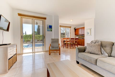 Modern, clean and open plan space with lots of light opening to pool area. 