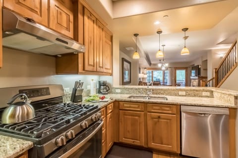 Open kitchen to the breakfast bar & dining area