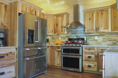 Who wouldn't love to cook up a storm in this gorgeous kitchen? All stainless, brand-new appliances, granite countertops, and plenty of work & storage space!
