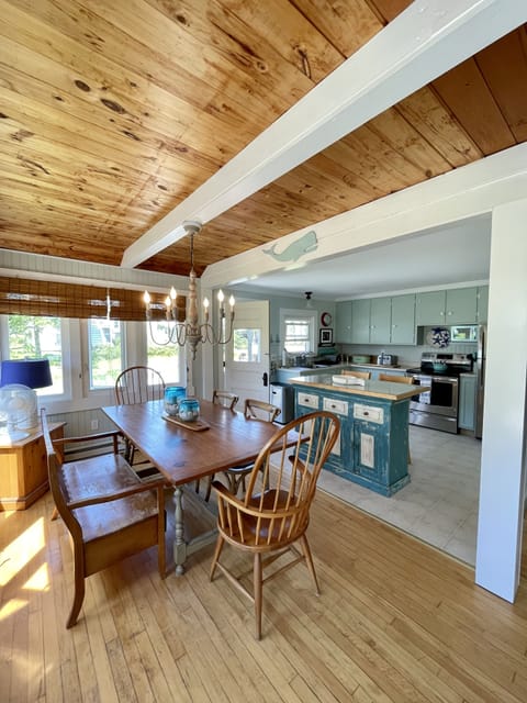 The dining table with kitchen in the background 