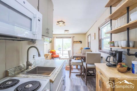 Enjoy modern, ful sized appliances in this quaint space.