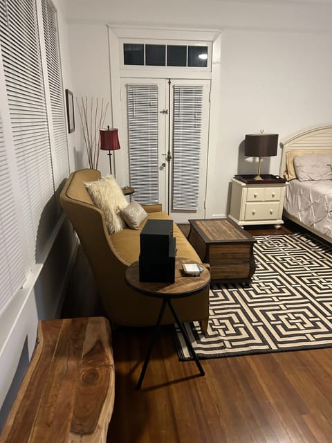 Front view of the studio and French door to the porch