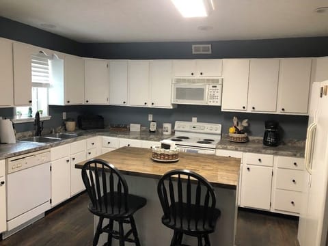 Very spacious equipped kitchen.