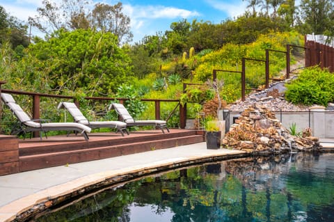 Enjoy the lounge chairs on the deck outside the pool.