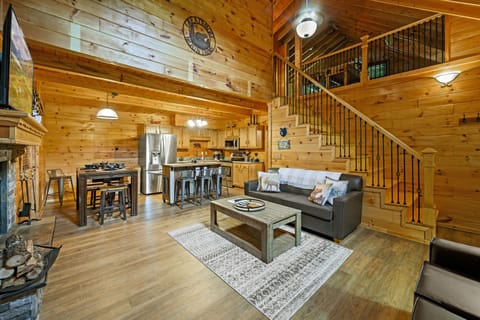 living room with view of loft