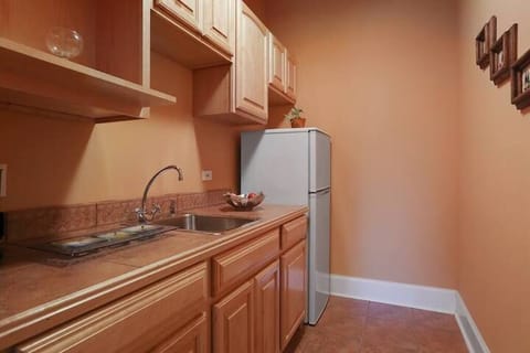 Kitchenette with refrigerator, microwave, coffee maker, sink....