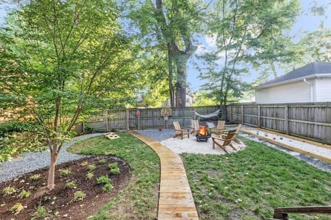 
The fully fenced backyard is ideal for both family gatherings and playful moments with furry friends, offering a safe and spacious environment for everyone to enjoy.