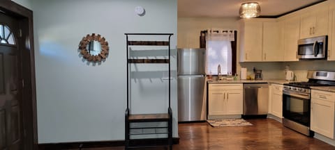 Entry to home with open view of entire space of kitchen and living area. 