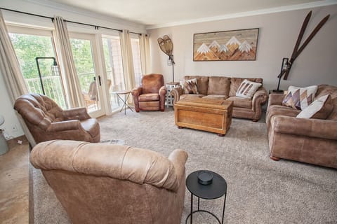Relax in spacious living room with seating for 8!