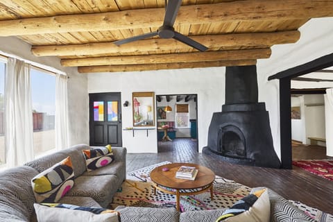 1000+ sq ft with full kitchen, full bath, 2bds, private patio, and wood-burning fireplace