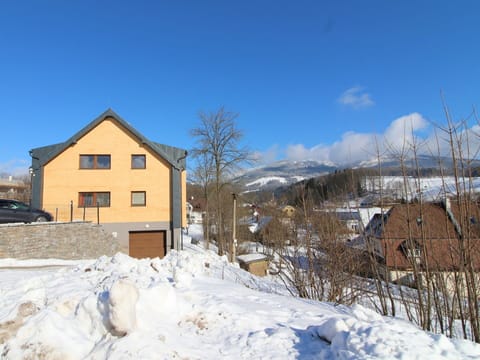 Sky, Cloud, Building, Daytime, Property, Snow, Window, Azure, House, Mountain