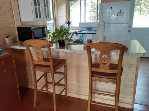 Bar seating at kitchen countertop. 