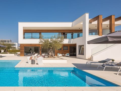 Water, Property, Daytime, Swimming Pool, Sky, Building, Azure, Shade, Outdoor Furniture, Leisure