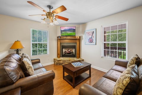 Relax in front of the fireplace and enjoy a good movie on the flatscreen TV. 