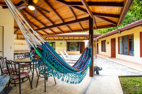 Patio area with covered-solar heated pool, bbq area.