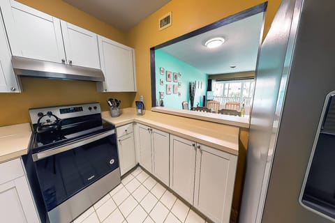 Small kitchen has everything you need.  Dishwasher included plus dishes, glasses and small appliances.