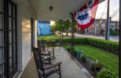 Rock on the porch or sit at the table and enjoy the beautiful outdoors!