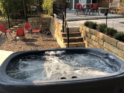 Hot Tub and Pool in backyard tropical paradise and grills fire pit too! And more