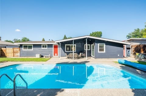 Large backyard pool, with stair entry and deep end is ideal for warmer months!