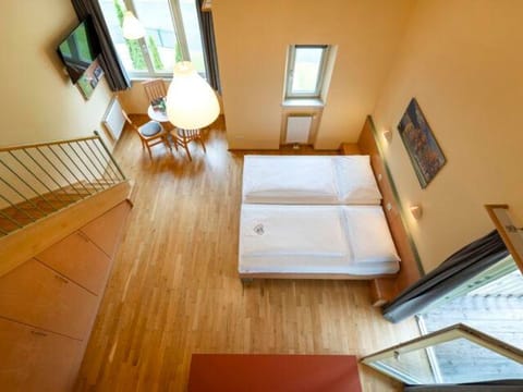 Five-bed room, shower, WC, comfort - JUFA Hotel Kaprun Bed and Breakfast in Piesendorf