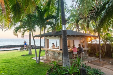 Enjoy a cocktail at sunset